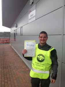 Phil with his category A pass certificate at Atherton Test Centre
