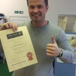 Andreas with his certificate before heading to the airport to catch his flight to Hong Kong!